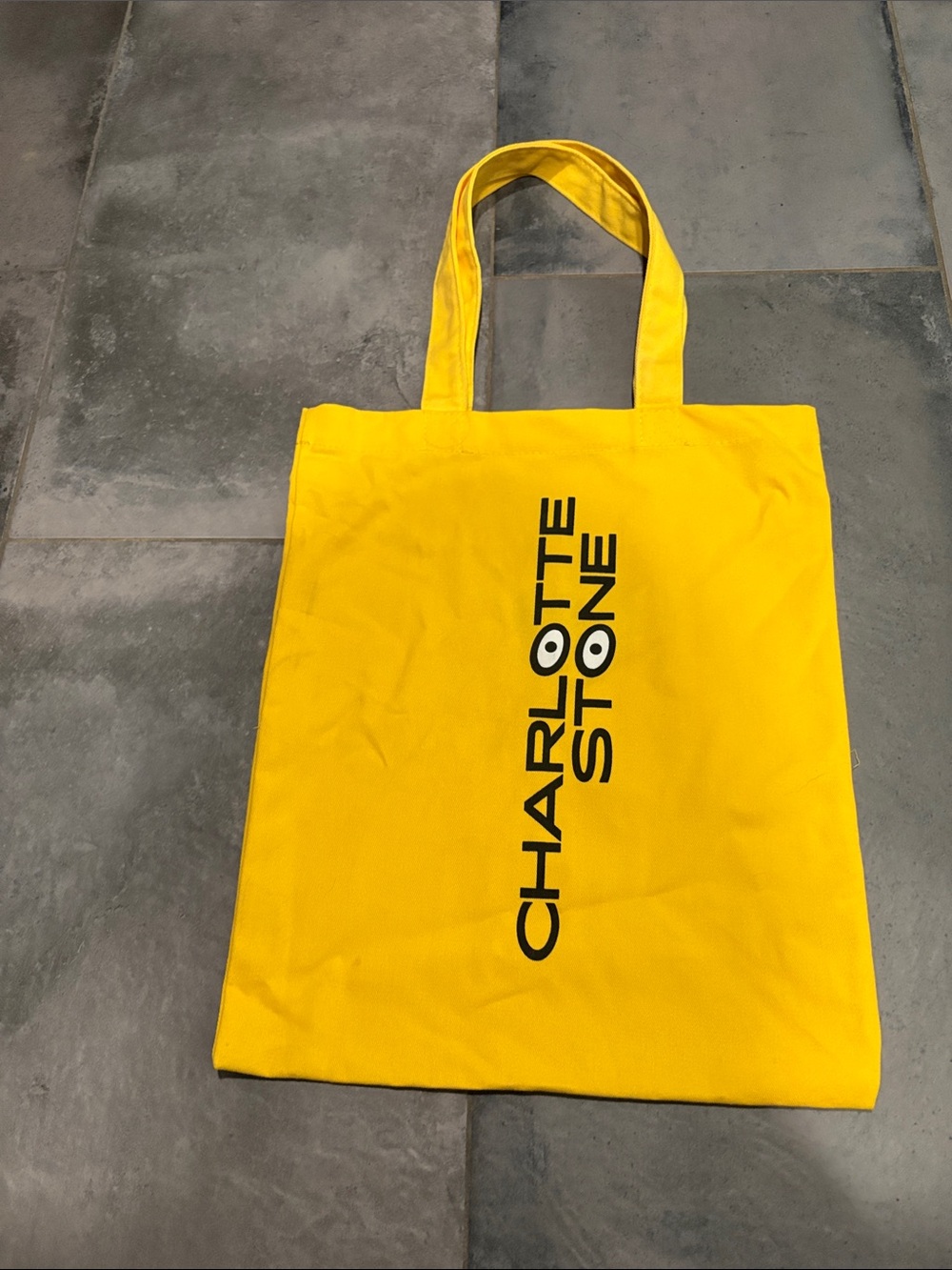 Charlotte Stone Bright Yellow Canvas Tote with Vertical Logo